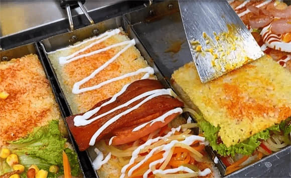 探秘美食之旅：锅巴饭——跨越南北的佳肴起源于哪里呢？
